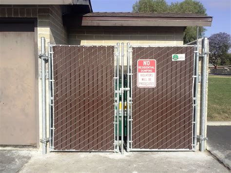 trash enclosure doors with metal panels fabrication details|trash enclosure with swingable gate.